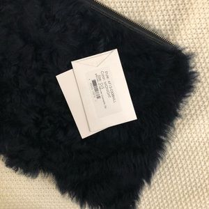 3.1 Phillim lim real fur Clutch